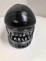 Front view showing sculpted teeth and dome