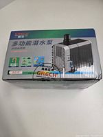 Box top showing GRECH branding and pump image