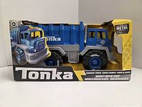 Front of boxed Tonka Mighty Metal Fleet garbage truck