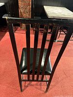 rear view of slat back showing paint wear