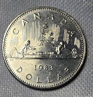 Reverse: CANADA 1983 DOLLAR with Voyageur canoe design