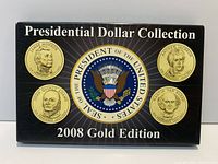 Front of outer presentation box showing Presidential Dollar Collection 2008 Gold Edition graphics