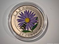 Reverse showing colorized purple flower and bee