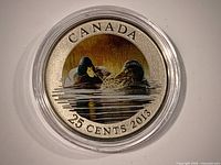 Reverse view showing colorized mallard design, denomination and year