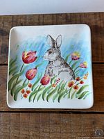 Front view of square plate with rabbit and tulip decoration