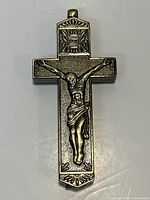 Front view showing crucifix design and material