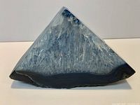 Front view showing polished agate edge and celestite crystal interior