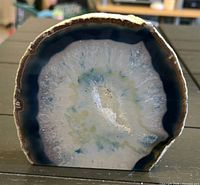 Front polished face showing blue band and quartz center