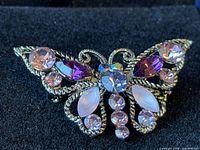 Front view of butterfly brooch showing rhinestone arrangement