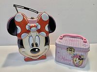 Front view of both Minnie Mouse metal lunchboxes