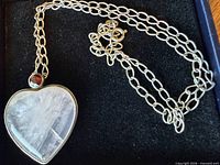 full necklace in box showing chain and pendant