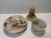 Group shot of all three brown/amber swirl pieces