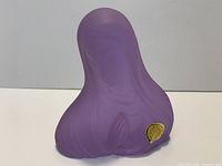 Entire purple glass sculpture front/side view