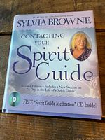 Front cover showing title, author, revised edition note, and CD inclusion graphic