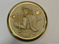 Top view of brass box showing resin relief design