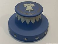 Overall view showing top and side relief on blue jasperware Liberty Bell commemorative