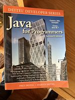 Front cover displaying title, series, authors, edition, key features.