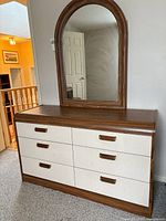 Front view of dresser with mirror