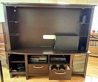 Front view of entire entertainment unit showing both pieces assembled