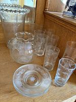Group shot showing both vases, seven tumblers and shallow etched bowl