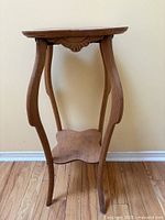 Full view of wooden plant stand, showing overall design