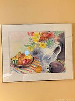 Larger framed watercolour still life with jug, flowers and fruit