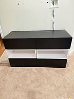 front view of IKEA Bestå cabinet with all drawers closed