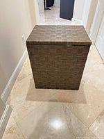 Front view of rectangular brown woven-pattern fabric storage bin