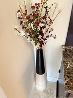 Full view of vase with artificial arrangement