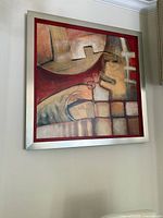 Front view of framed abstract wall art showing overall design and frame