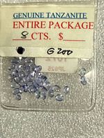 Front of packet showing tanzanites and label stating Genuine Tanzanite Entire Package 8 Cts