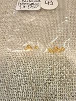 Front view of bag showing yellow sapphires