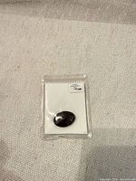 Gemstone in sealed pouch front view