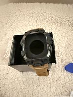 Ultimal rugged watch case band sitting on original box