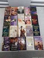 All 20 paperback romance novels arranged in 4×5 grid