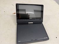 Player open showing screen and controls