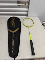 Racket and case overview on table