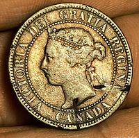 Obverse showing Queen Victoria profile and edge clip marks