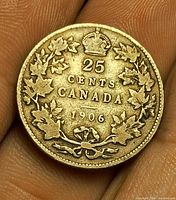 Reverse of 1906 Canada 25¢ coin showing wreath, crown, denomination, date