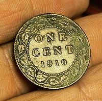 Reverse of 1910 Canadian large cent showing ONE CENT 1910 within maple leaf wreath