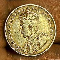 Obverse view showing crowned portrait of King George V and legend GEORGIVS V DEI GRA REX ET IND IMP