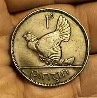 Reverse of coin showing hen with chicks and 1d denomination