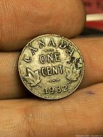 Reverse of 1932 Canada one-cent coin displaying maple leaves, ONE CENT legend and date