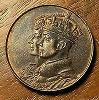Obverse showing crowned portraits of King George VI and Queen Elizabeth