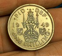 Reverse side showing 1949 date, crowned lion on crown, shields, denomination