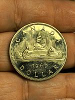 Reverse side showing Voyageur design and 1969 date