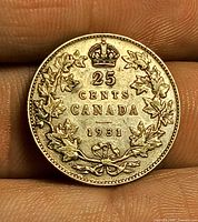 Reverse of 1931 Canadian quarter showing denomination, date, wreath