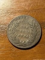 Obverse showing EAST INDIA COMPANY and ONE QUARTER ANNA within wreath