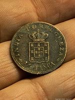 Obverse with crowned Portuguese shield and denomination