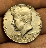 Obverse showing JFK profile, LIBERTY, date 1776-1976, D mint mark